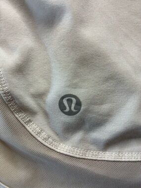 lululemon athletica white performance top with interior tag